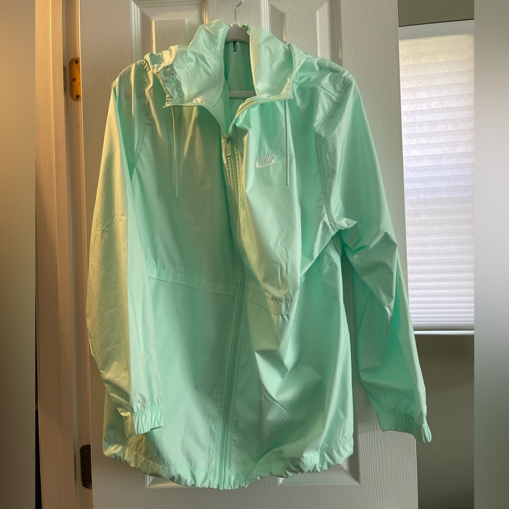 Niki new hooded windbreaker nylon XL.